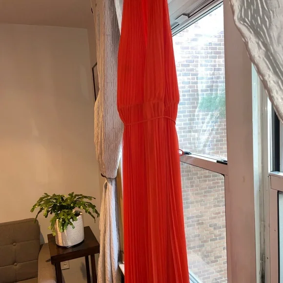 Beautiful vibrant orange high neck jumpsuit